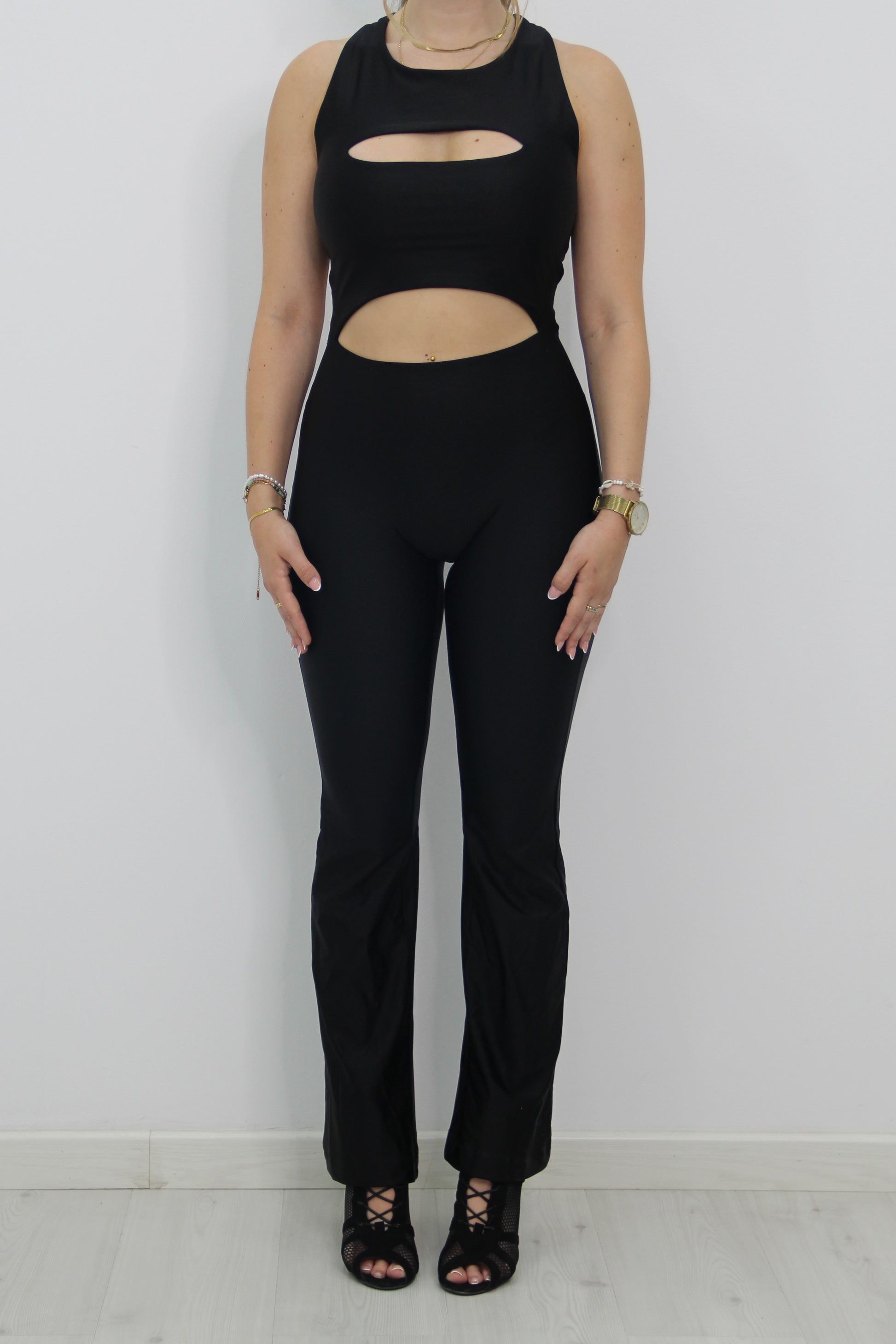 Mono cruzado negro de Rittmo, diseño completo de cuerpo entero para bailarinas de baile bachata con estilo.